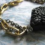 Black carved cinnabar multi..