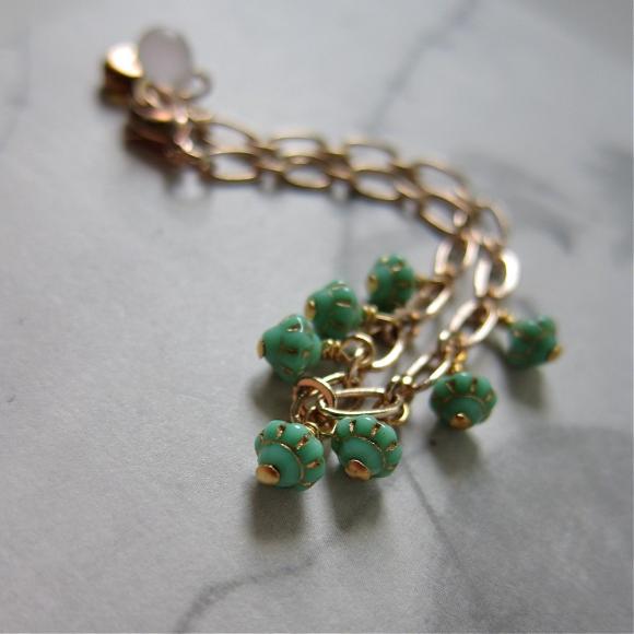 Saturn bracelet - rose gold chain with vintage glass (in mint green)